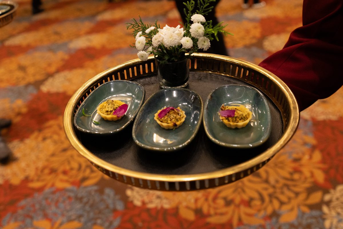 Luxury pass-around service with bruschettas, avocado cream, pomegranate, microgreens