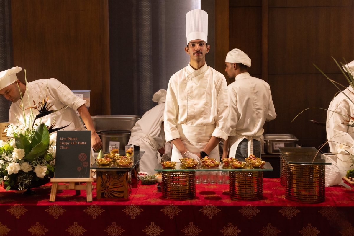 Chef Kenzo chef at a premium event live counter — Live-Plated Crispy Kale Patta Chaat